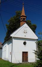 https://upload.wikimedia.org/wikipedia/commons/thumb/b/b3/Kapli%C4%8Dka_svat%C3%A9_Anny_-_zadn%C3%AD_pohled%2C_Ludm%C3%ADrov%2C_okres_Prost%C4%9Bjov.jpg/800px-Kapli%C4%8Dka_svat%C3%A9_Anny_-_zadn%C3%AD_pohled%2C_Ludm%C3%ADrov%2C_okres_Prost%C4%9Bjov.jpg