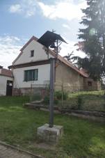 Overview of bell tower at J�lovi��sk� street in Lipence, Prague.jpg